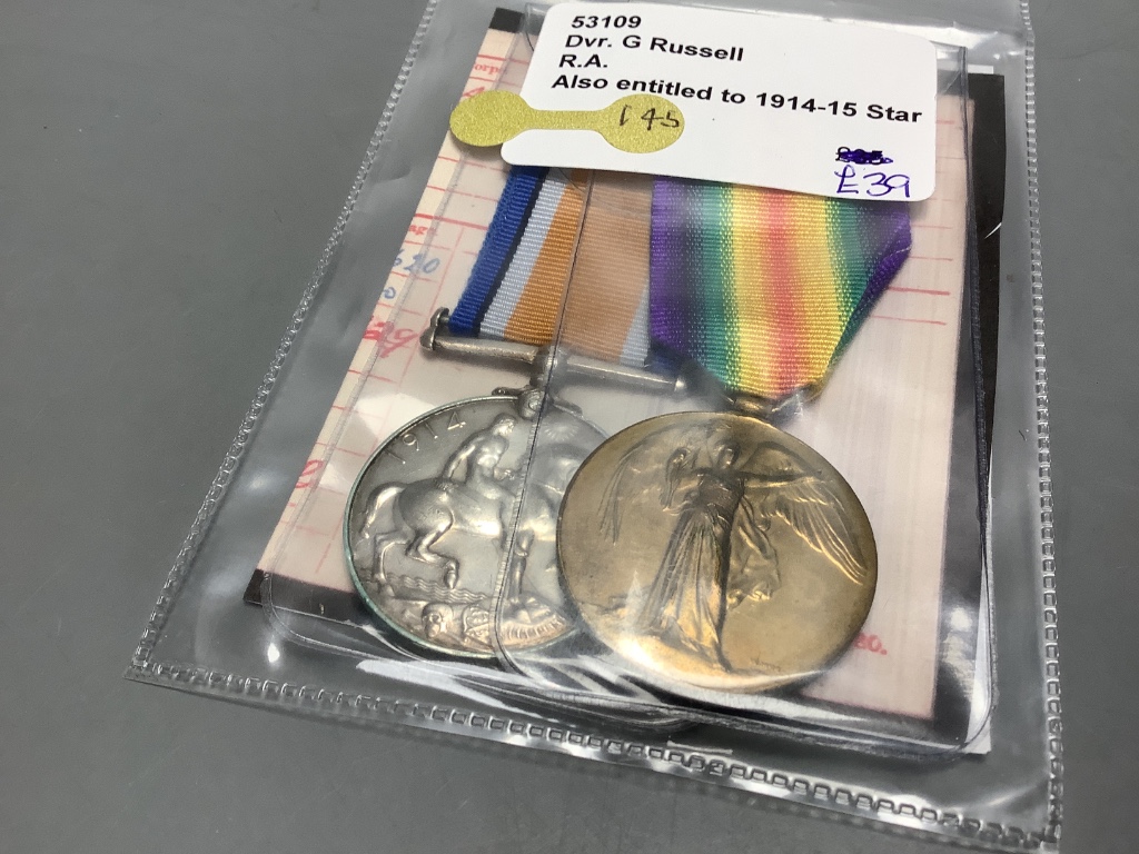 A collection of WW1 medal pairs